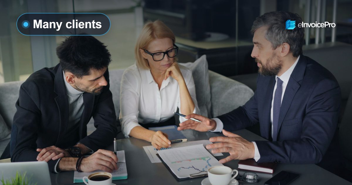 An adviser going through papers with clients